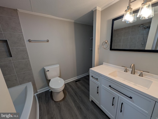 full bathroom with toilet, crown molding, wood-type flooring, a textured ceiling, and vanity