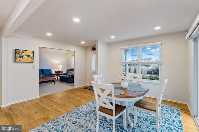 dining area with light hardwood / wood-style flooring