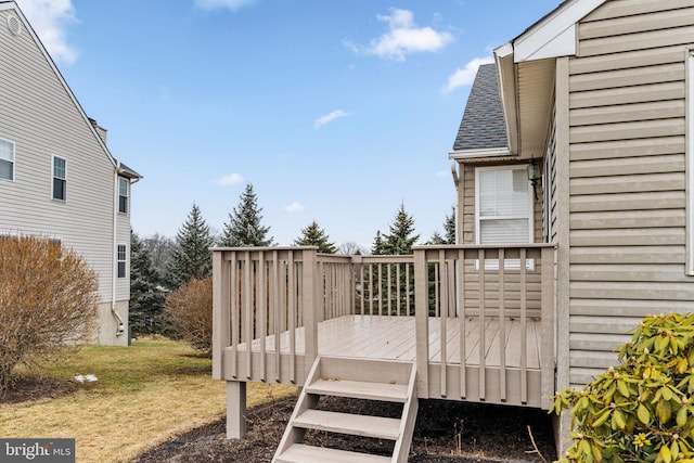 deck featuring a lawn