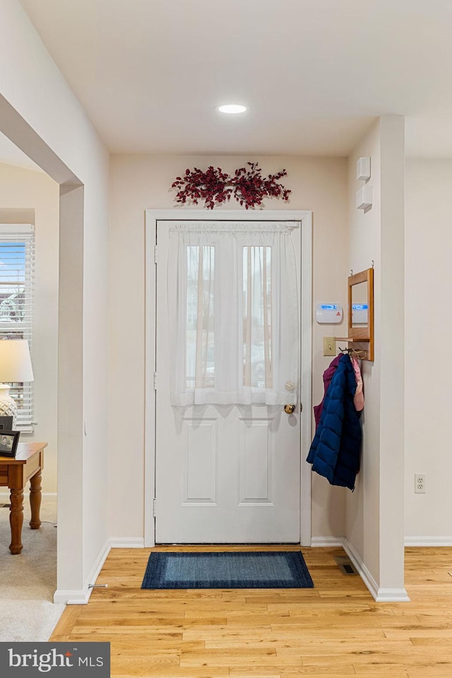 entrance foyer featuring light wood-type flooring