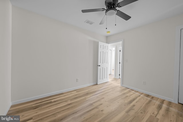 unfurnished room featuring ceiling fan and light hardwood / wood-style floors