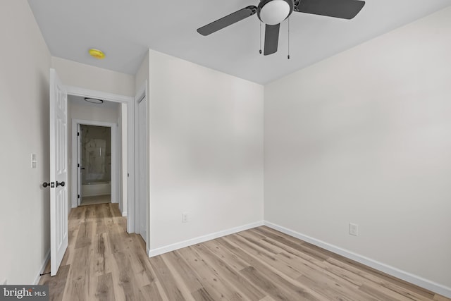 spare room featuring light wood-type flooring