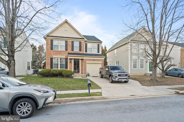 view of front of house with a garage and a front yard