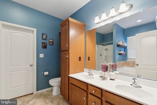 full bathroom featuring plus walk in shower, vanity, and toilet