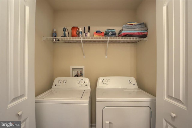 laundry room featuring washer and dryer