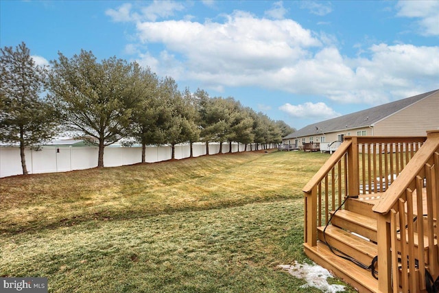 view of yard with a deck