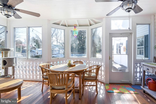 sunroom with plenty of natural light and ceiling fan