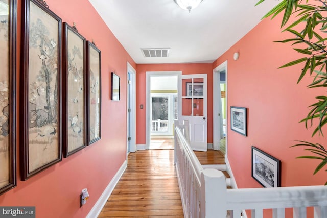 hall featuring light hardwood / wood-style floors