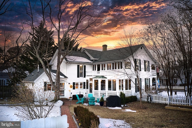 view of snow covered property