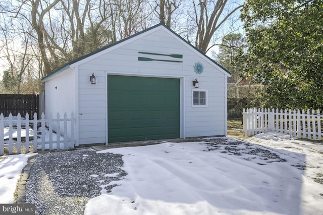 view of snow covered garage