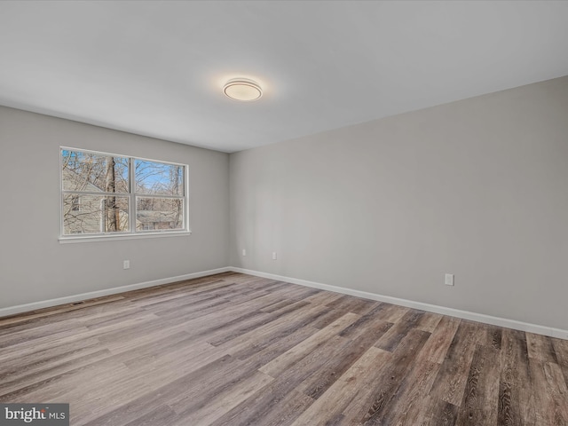 empty room featuring light hardwood / wood-style floors