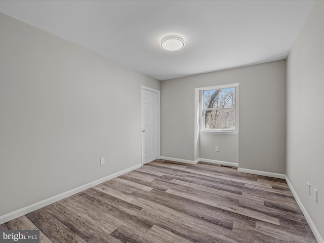 empty room with light wood-type flooring