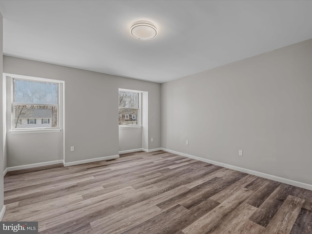 empty room with light wood-type flooring