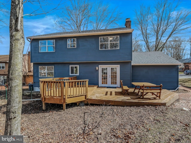 back of property with french doors and a deck