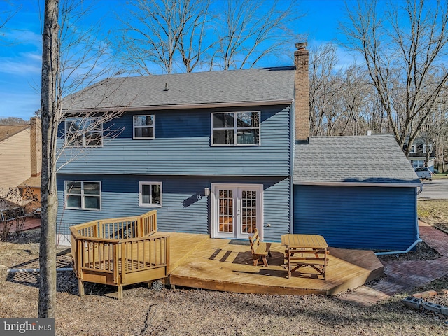 rear view of property with a deck