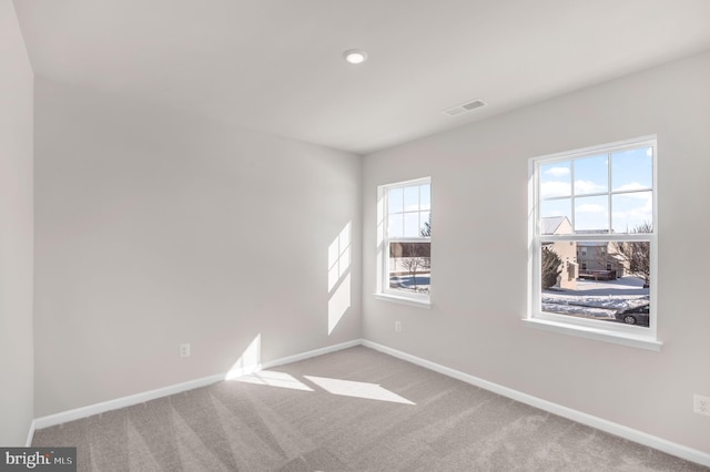 view of carpeted spare room