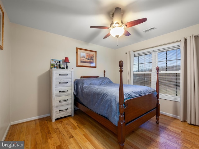 bedroom featuring ceiling fan and light wood-type flooring