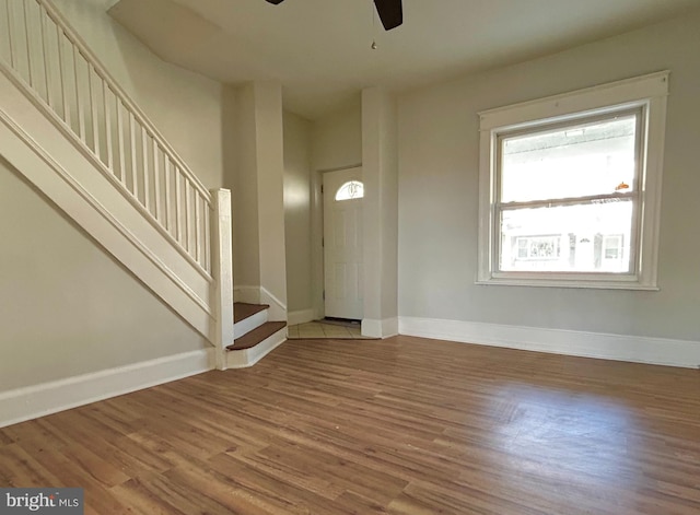 entryway with hardwood / wood-style floors and ceiling fan