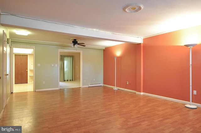 unfurnished room with a baseboard heating unit, crown molding, wood-type flooring, and ceiling fan