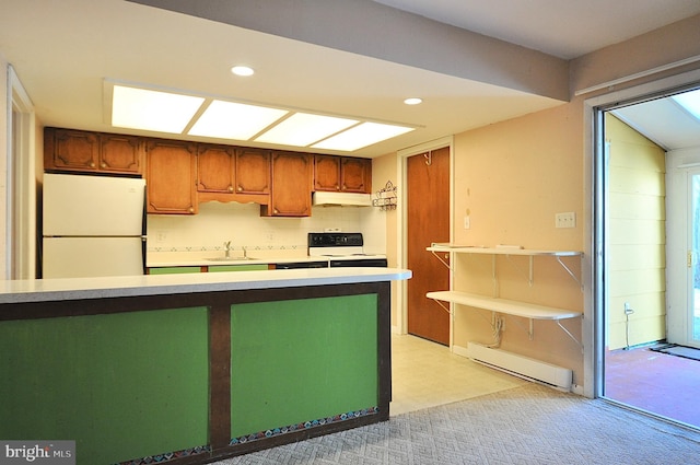 kitchen with sink, electric range, a baseboard radiator, light colored carpet, and white fridge