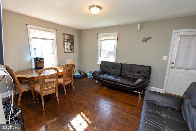 dining space featuring dark hardwood / wood-style floors