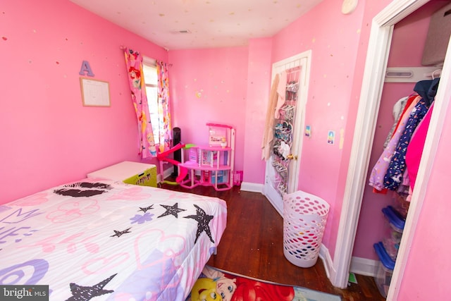 bedroom featuring hardwood / wood-style flooring