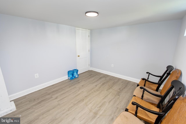 sitting room with light wood-type flooring