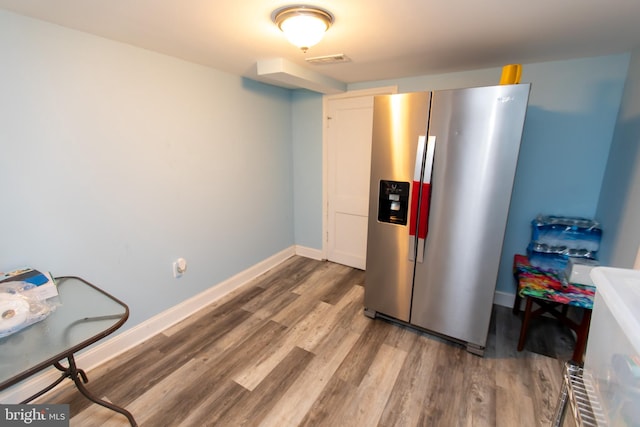 interior space with hardwood / wood-style floors