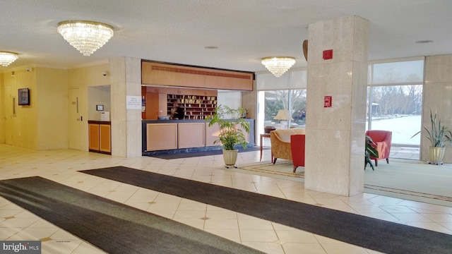 reception area featuring a notable chandelier