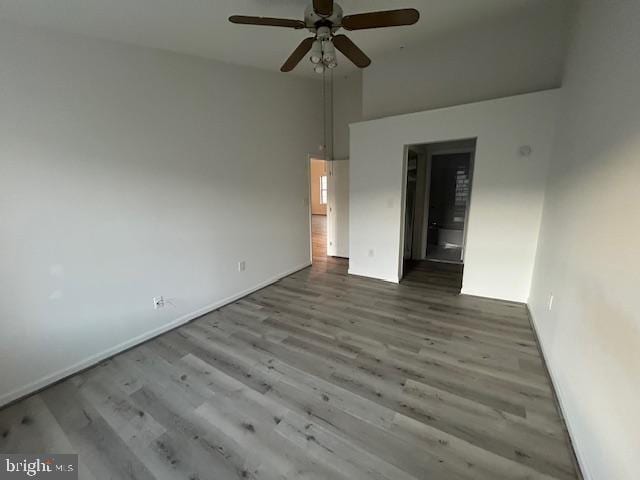 unfurnished bedroom featuring ceiling fan and hardwood / wood-style floors