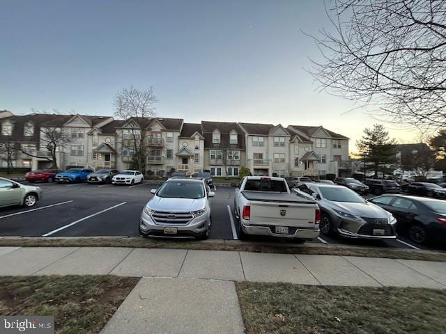 view of parking at dusk