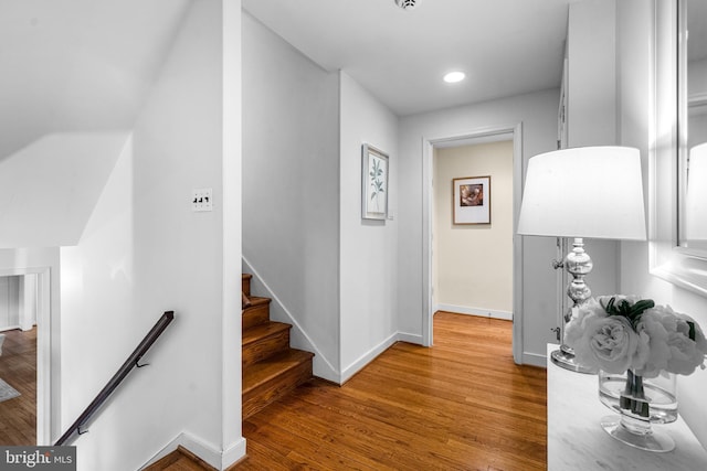 hallway featuring wood-type flooring