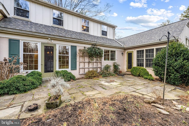 back of property featuring a patio area