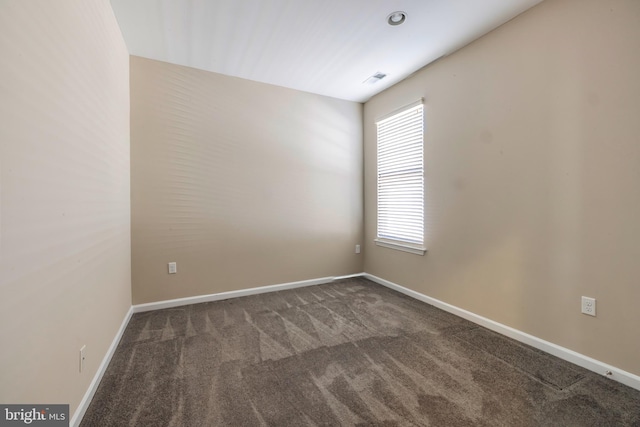 view of carpeted spare room