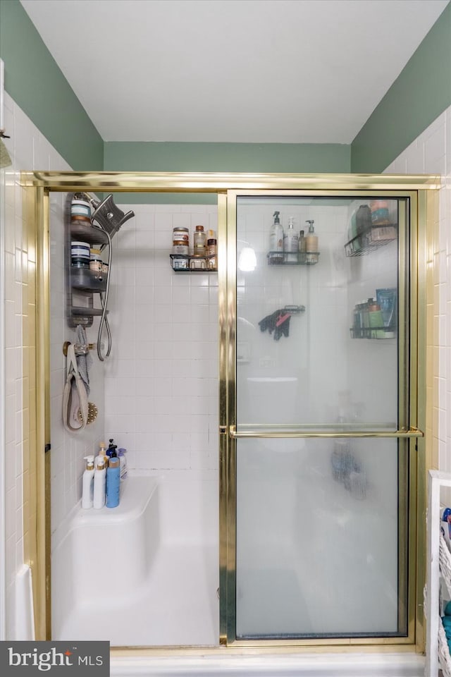 bathroom featuring walk in shower