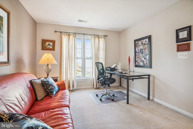 home office with light colored carpet