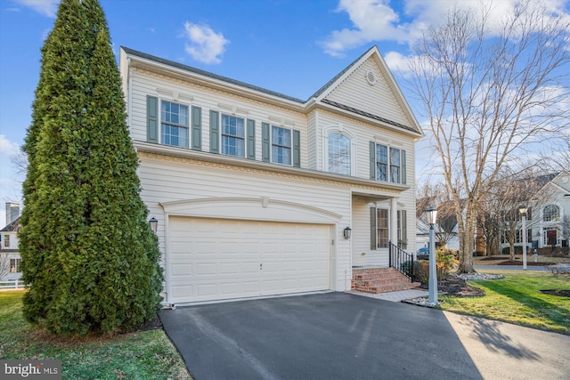 view of front of house with a garage