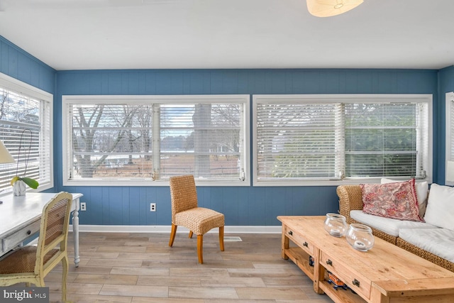 sunroom / solarium featuring a wealth of natural light