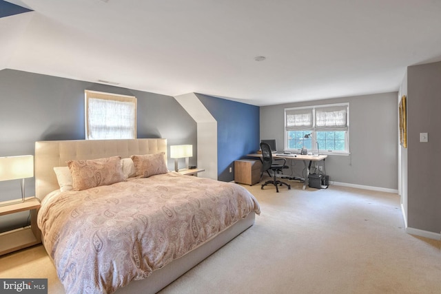 bedroom with light carpet