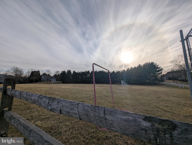 view of yard at dusk