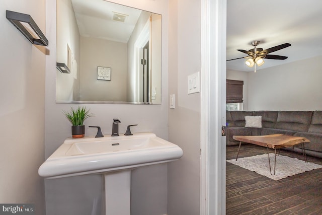 bathroom featuring wood-type flooring, sink, and ceiling fan