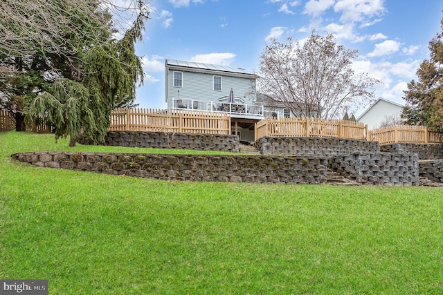 view of yard with a wooden deck