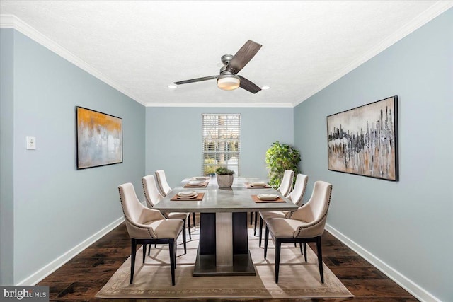 dining space with ceiling fan, ornamental molding, dark hardwood / wood-style flooring, and a textured ceiling