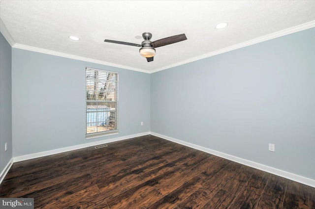 empty room with crown molding, ceiling fan, dark hardwood / wood-style floors, and a textured ceiling