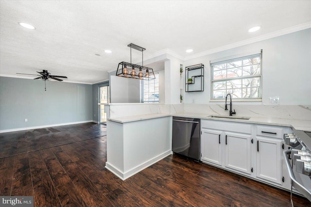 kitchen featuring sink, dishwasher, kitchen peninsula, white cabinets, and stove