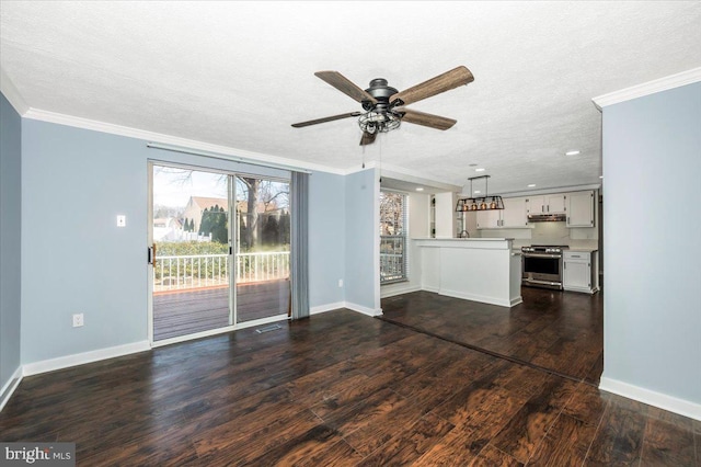 unfurnished living room featuring ceiling fan, ornamental molding, dark hardwood / wood-style floors, and a textured ceiling