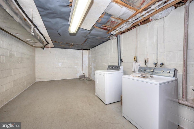 laundry area with washing machine and dryer