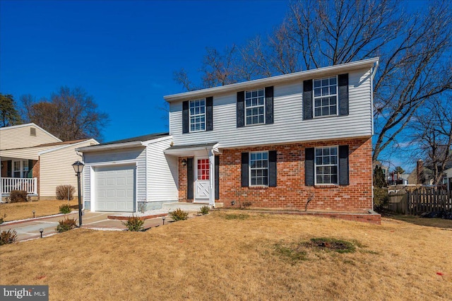 view of front of home with a garage and a front yard