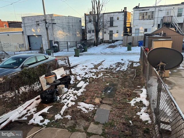 view of yard covered in snow