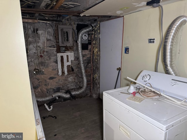 clothes washing area with dark hardwood / wood-style floors, washer / clothes dryer, and electric panel